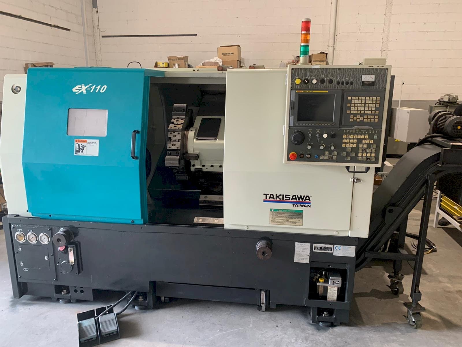 Frontansicht der Takisawa EX-110 Maschine