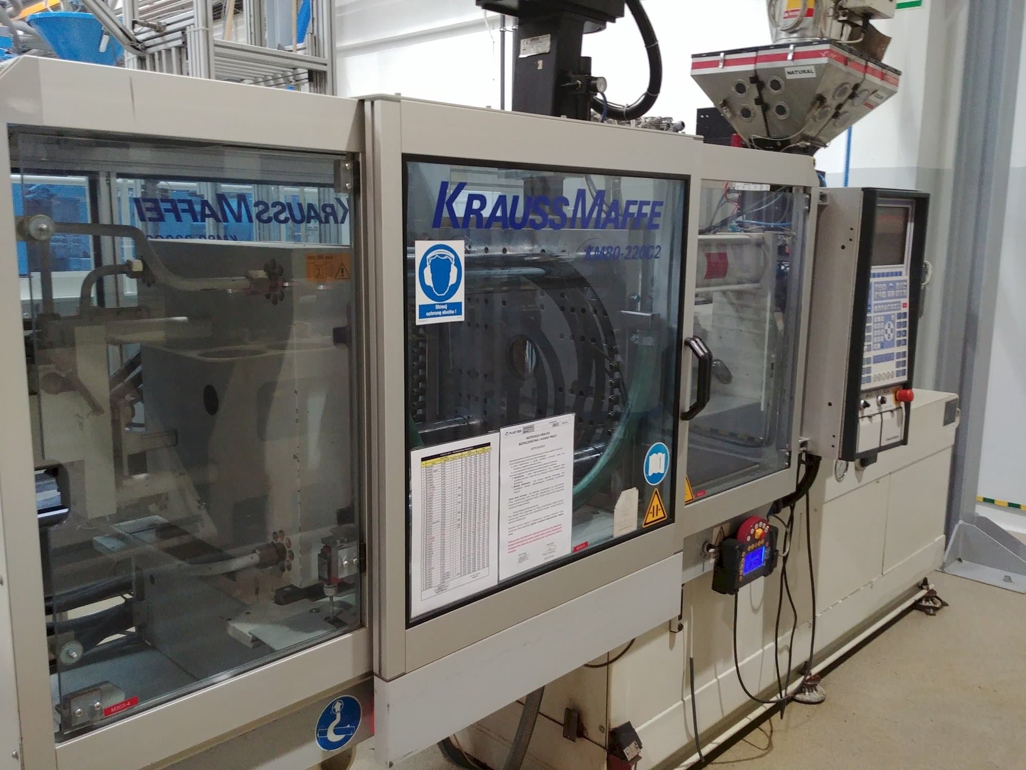 Linke Ansicht der Krauss Maffei KM 80-220 C Maschine
