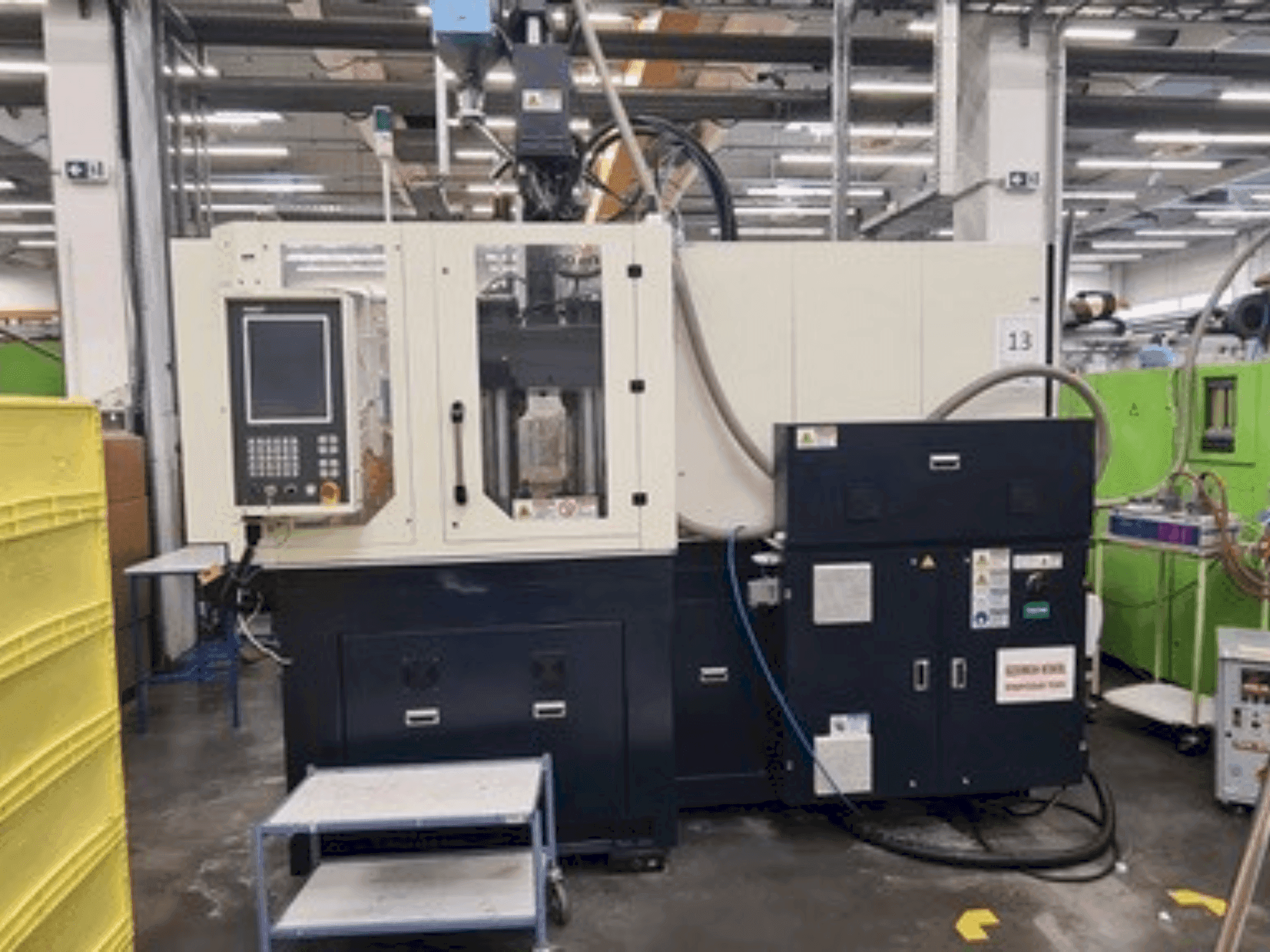 Frontansicht der WOOJIN VHA120RS  Maschine