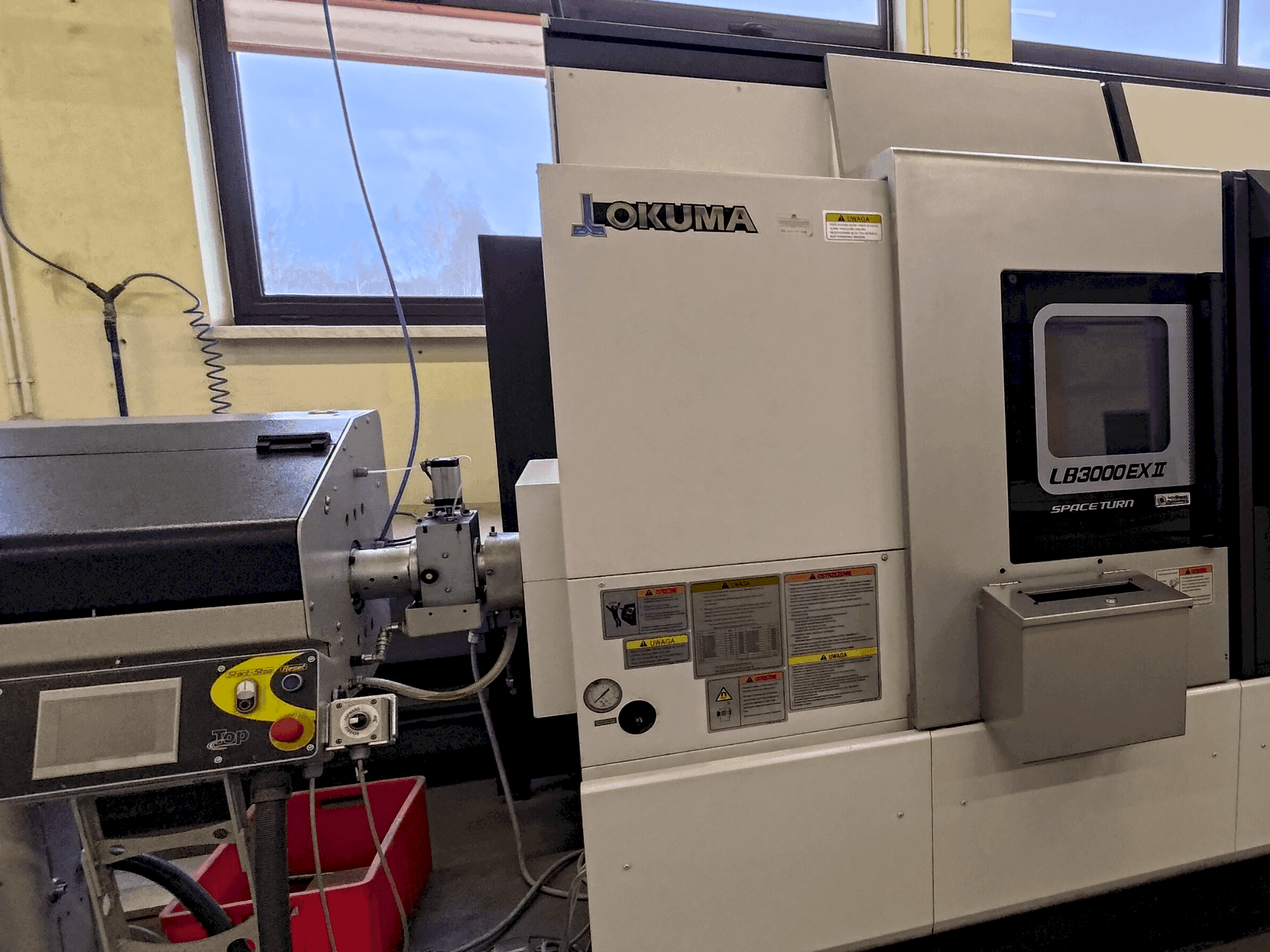 Frontansicht der Okuma LB 3000 EXII MYW 450  Maschine