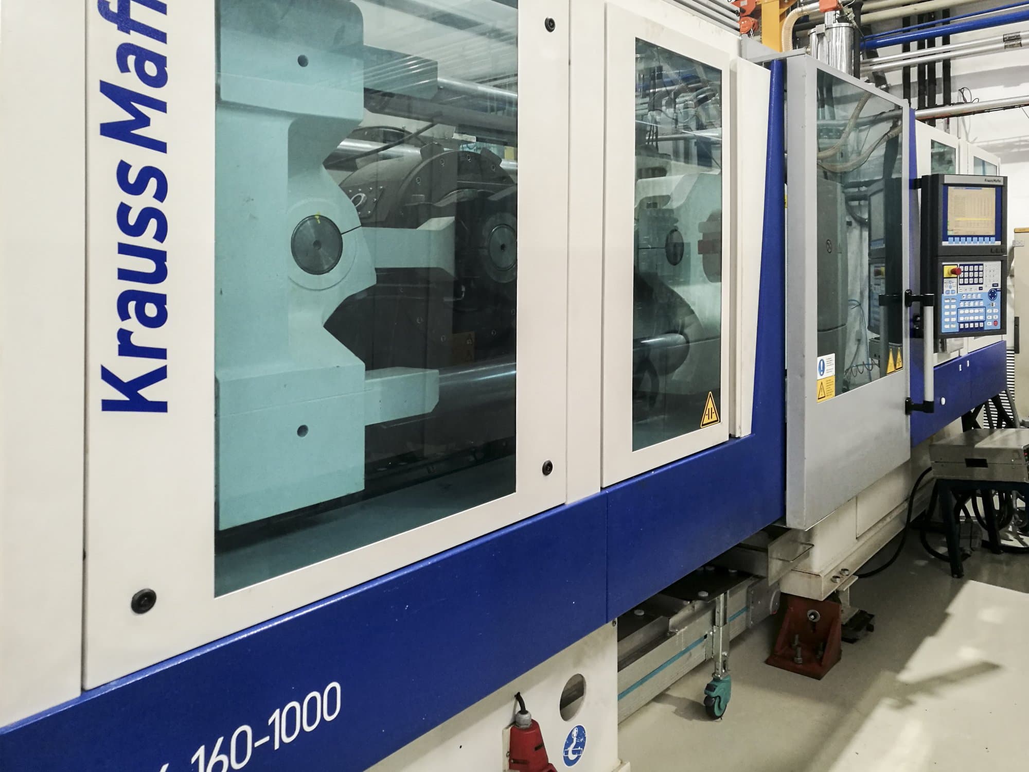 Linke Ansicht der Krauss Maffei 160-1000 EX Maschine