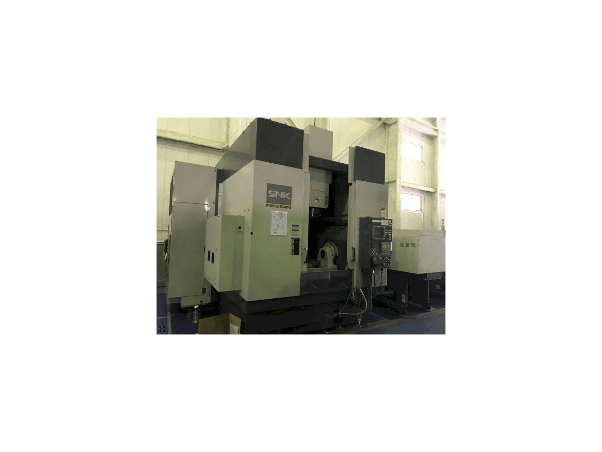 Frontansicht der SNK Nissin Maschine