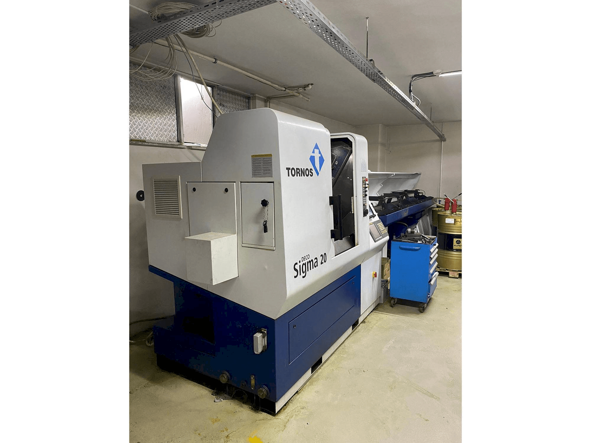 Left side view of Tornos Delta Sigma 20 machine