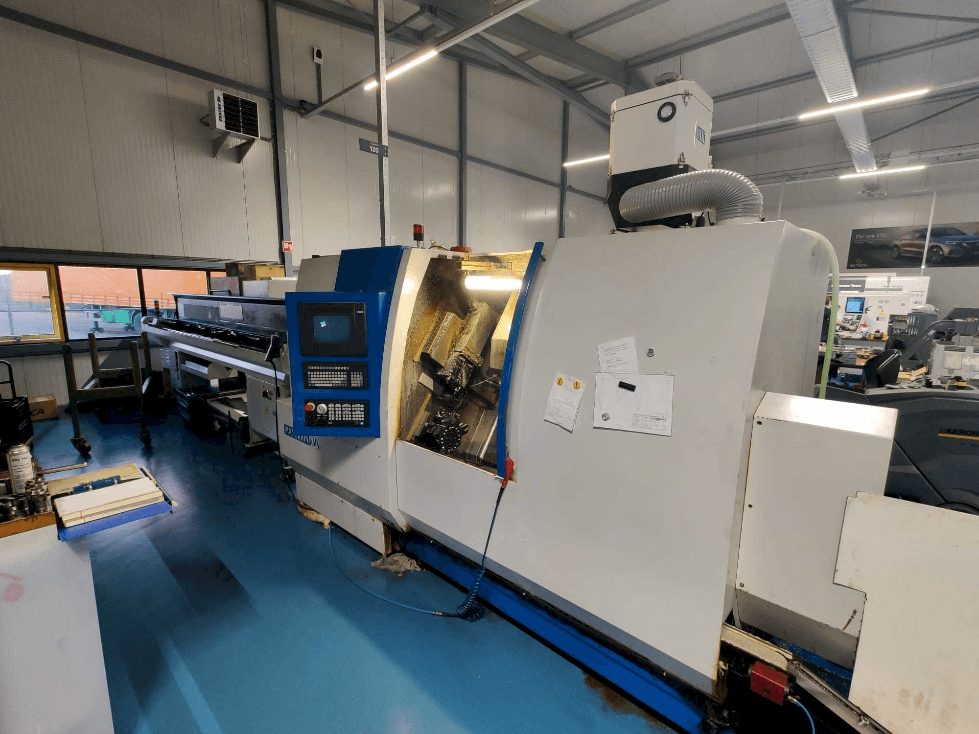 Frontansicht der Manurhin K'MX XL 32 Maschine