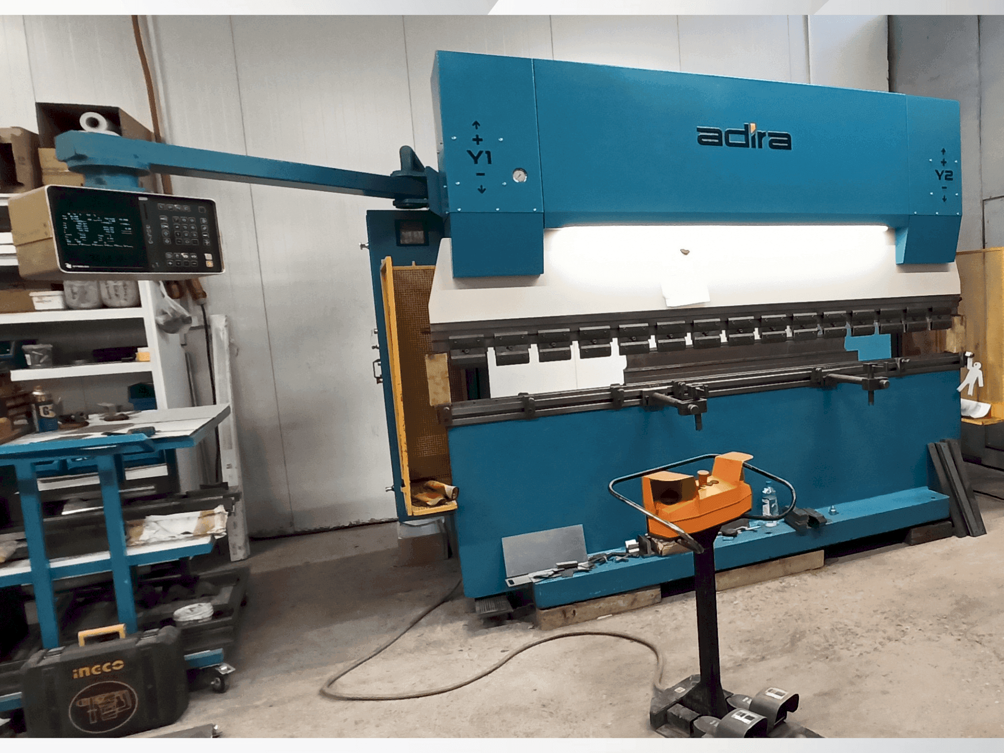 Front view of ADIRA QIH-11030 DNC CR machine