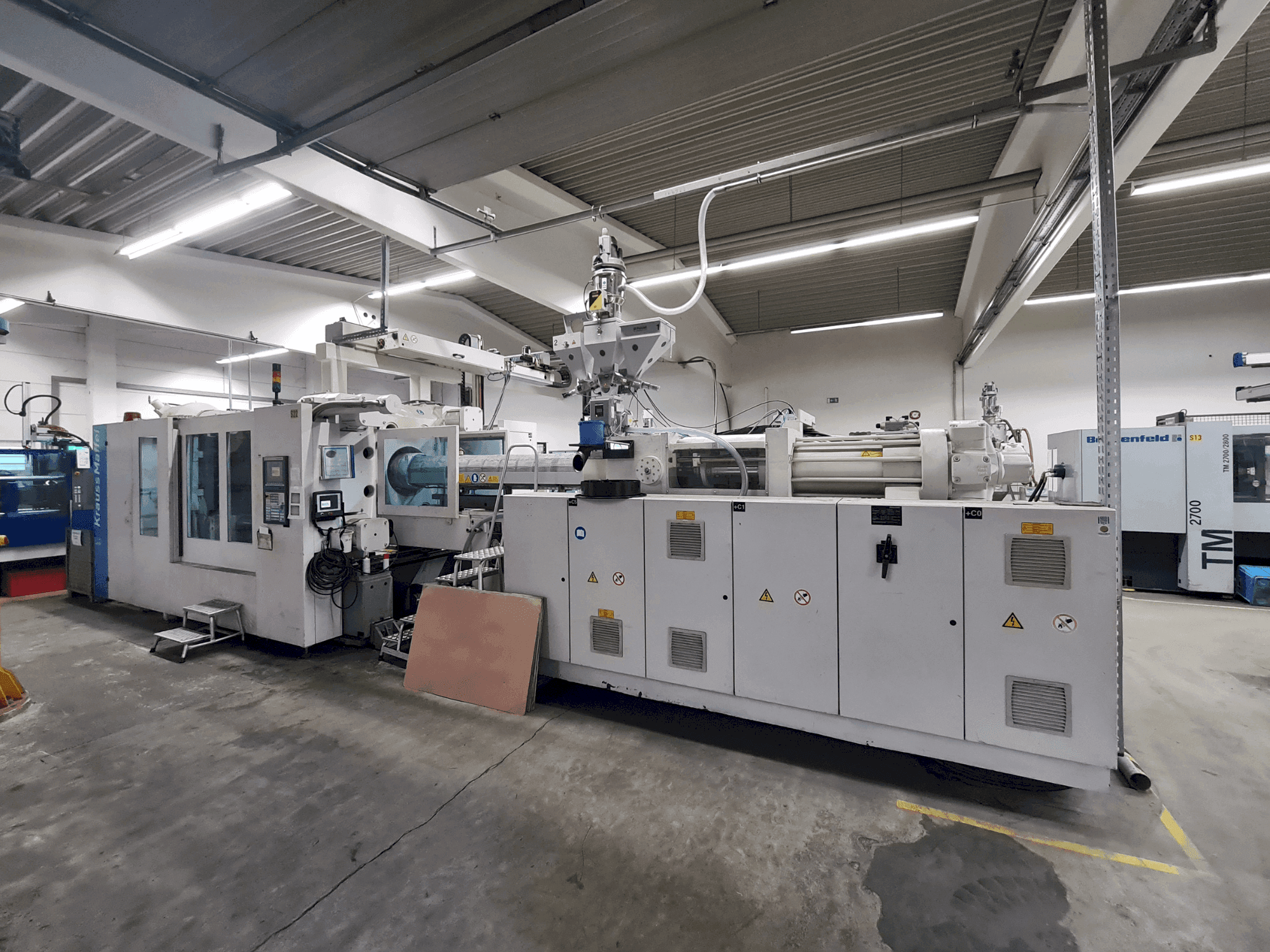 Front view of Krauss Maffei 800-6100 MX machine