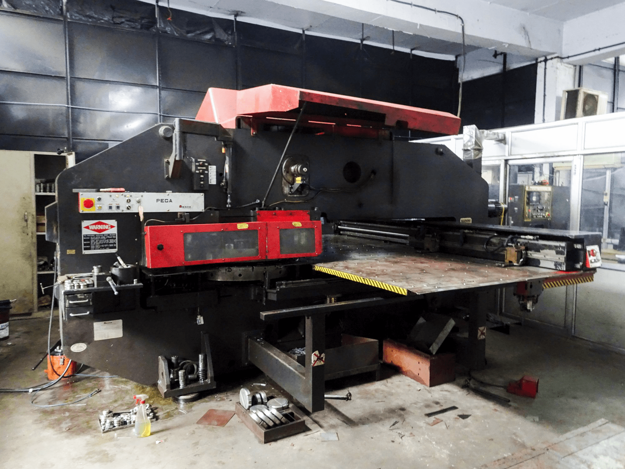 Left view of AMADA PEGA 357 machine
