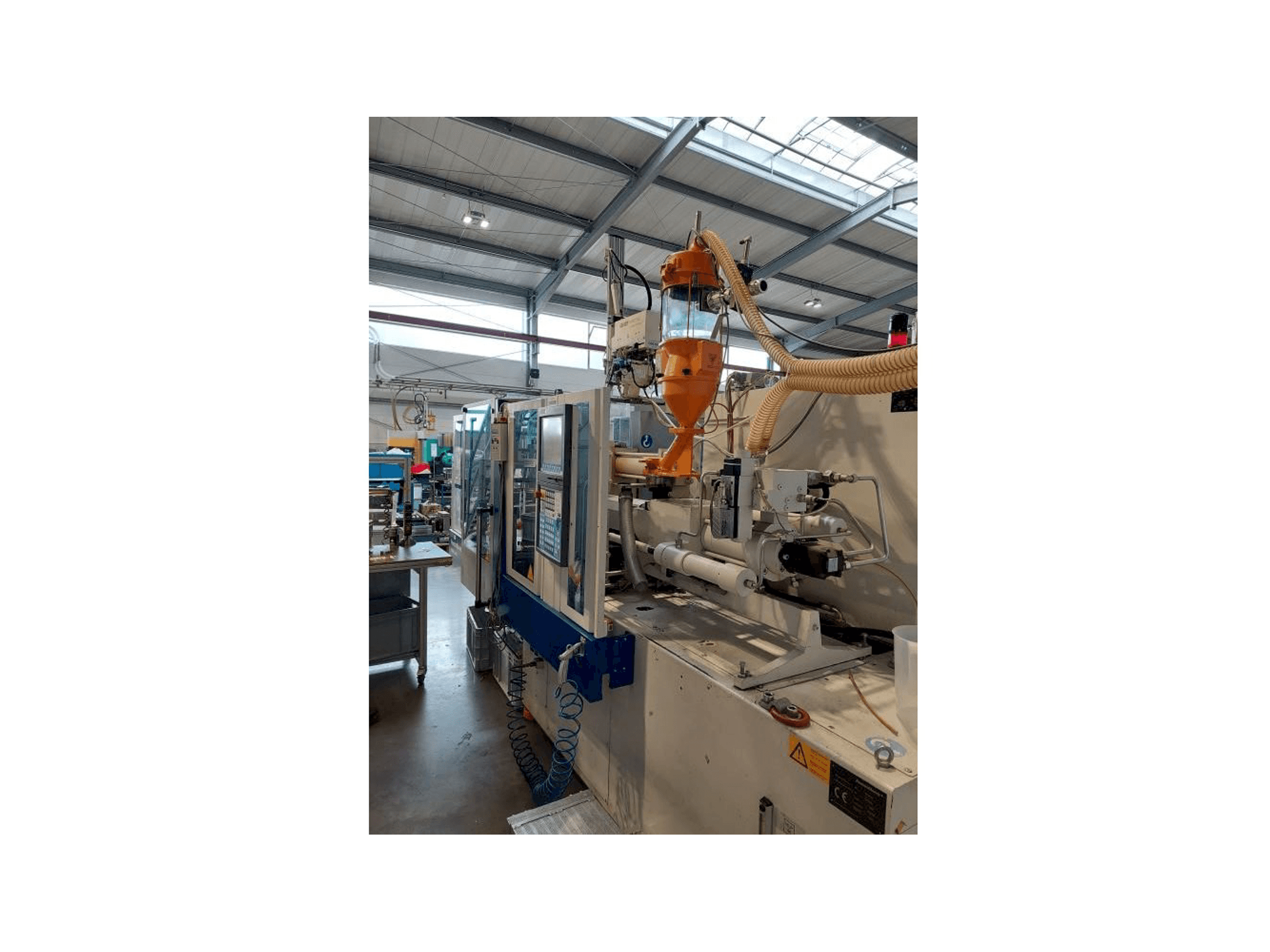 Frontansicht der Krauss Maffei 80-180 CX Maschine