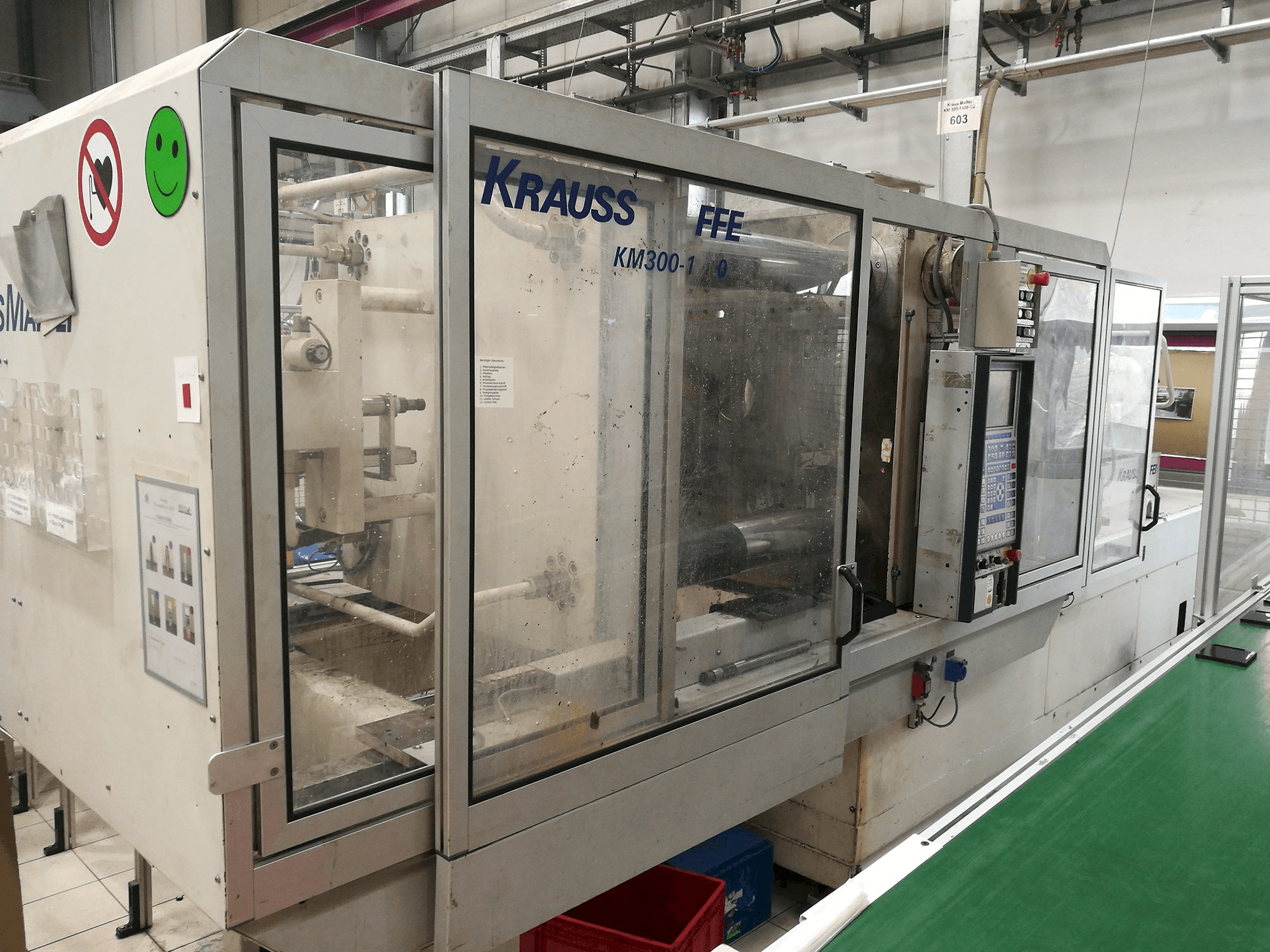 Left view of Krauss Maffei KM 300-1400 C2 Machine