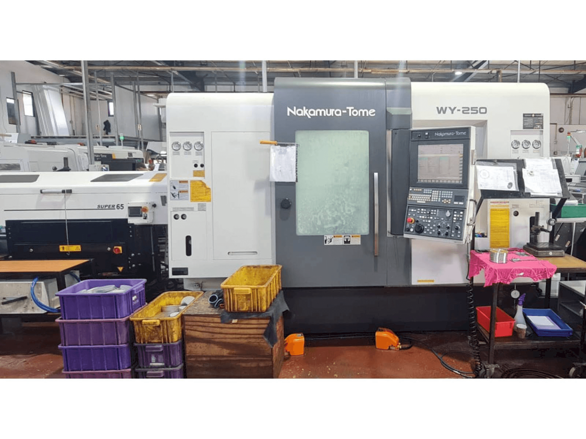 Front view of NAKAMURA-TOME WY 250 machine