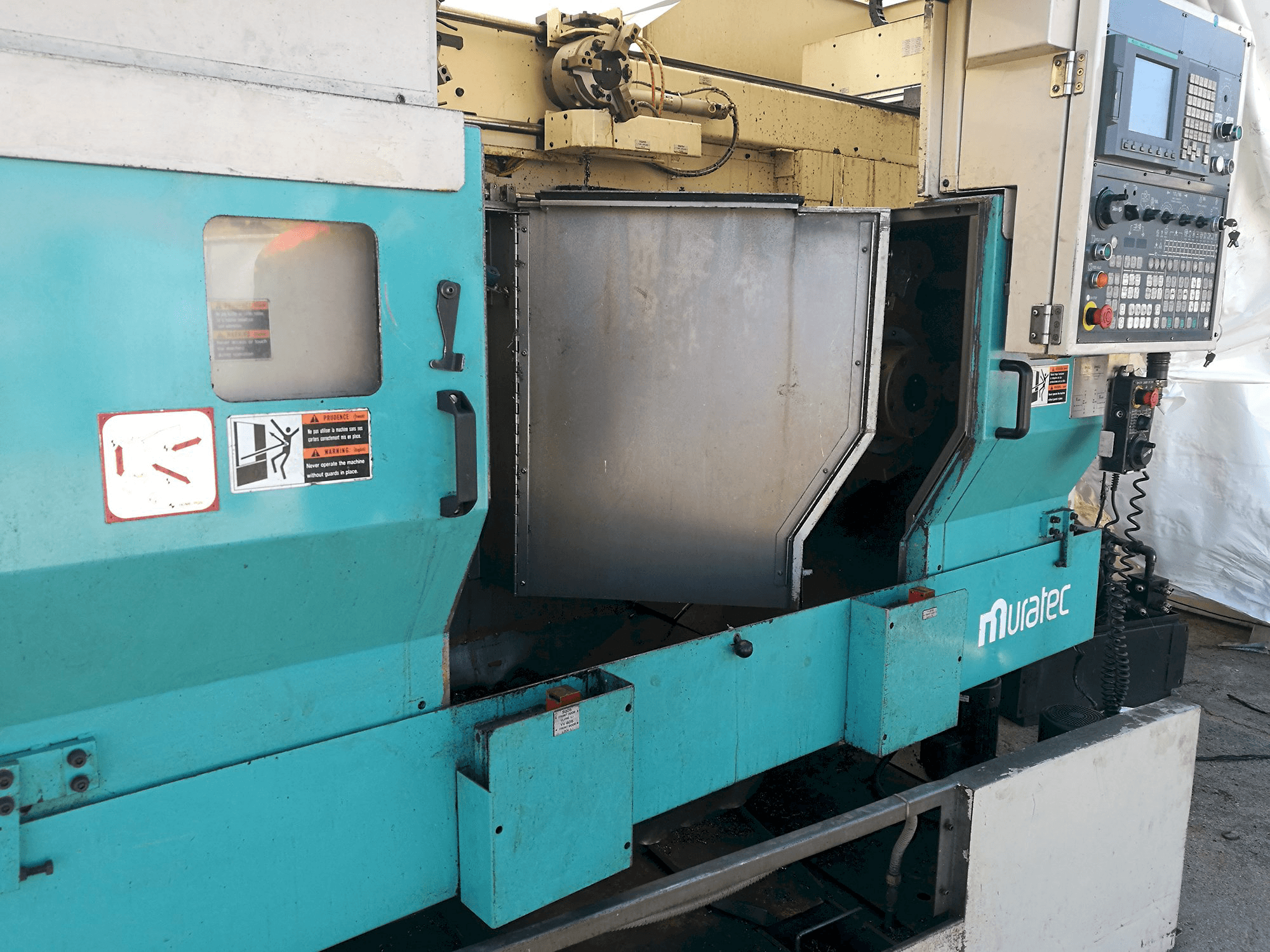 Linke Ansicht der MURATA Muratec MW 200 Maschine