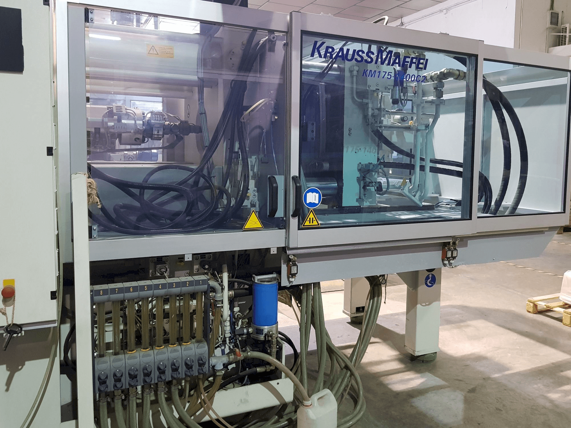 Front view of Krauss Maffei 175-1400 C2 machine