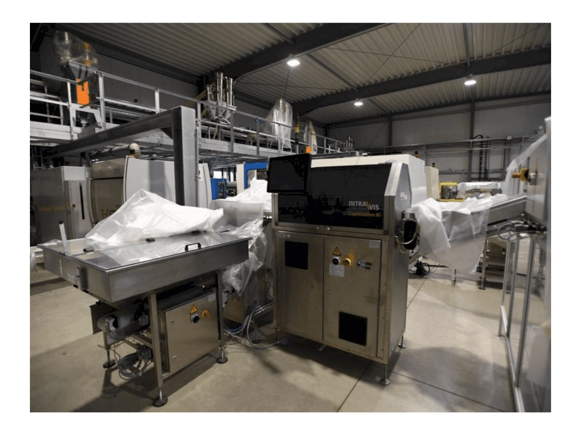 Front view of INTRAVIS Capwatcher 6275 machine