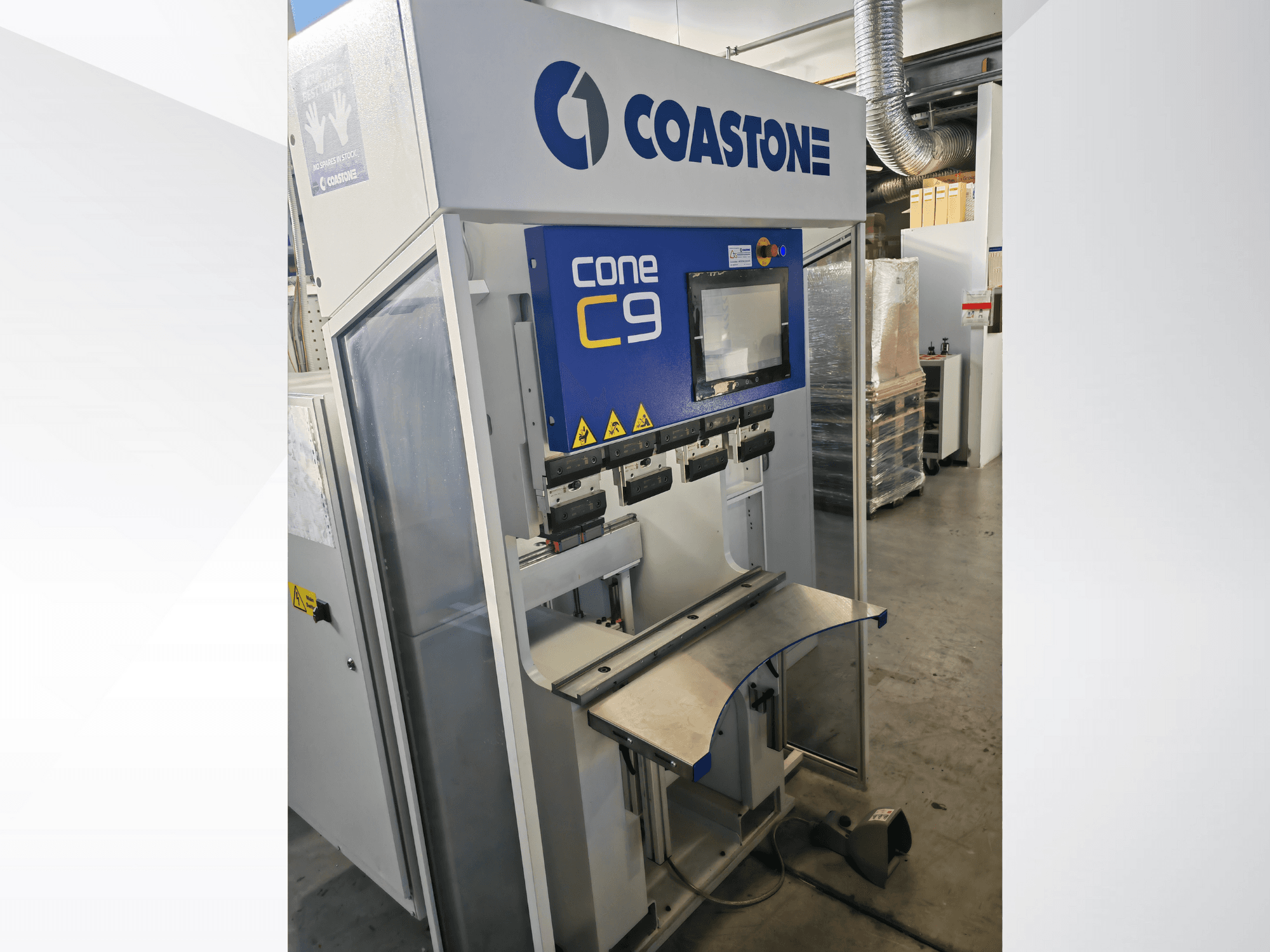 Coastone Cone C9 machine from a front view, featuring a control panel and stainless steel work surface.