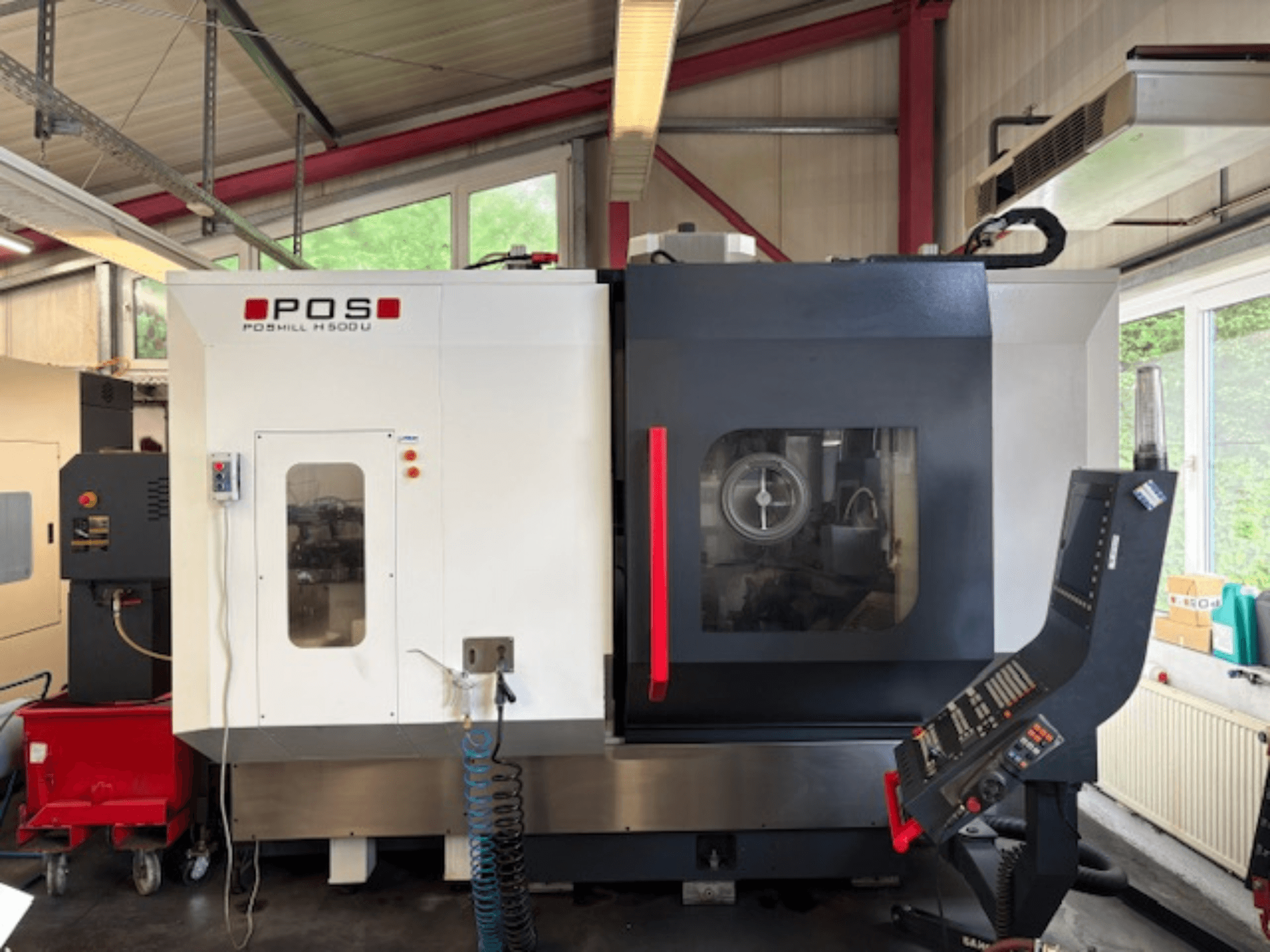 POS POMILL H500 U Fräsmaschine von vorne gesehen, mit Bedienfeld und Arbeitsfenster.