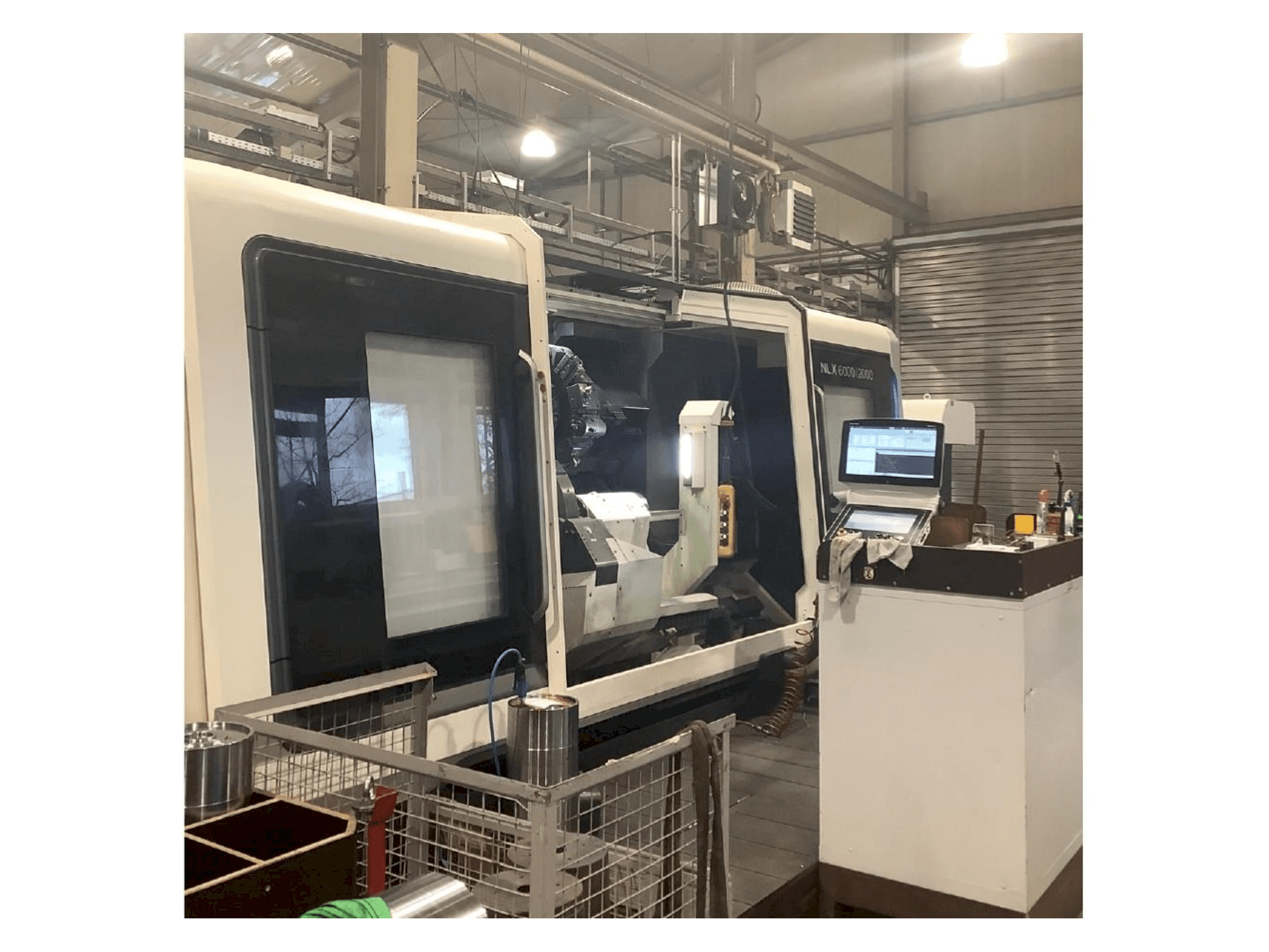 Frontansicht der DMG MORI NLX 6000 | 2000 Maschine
