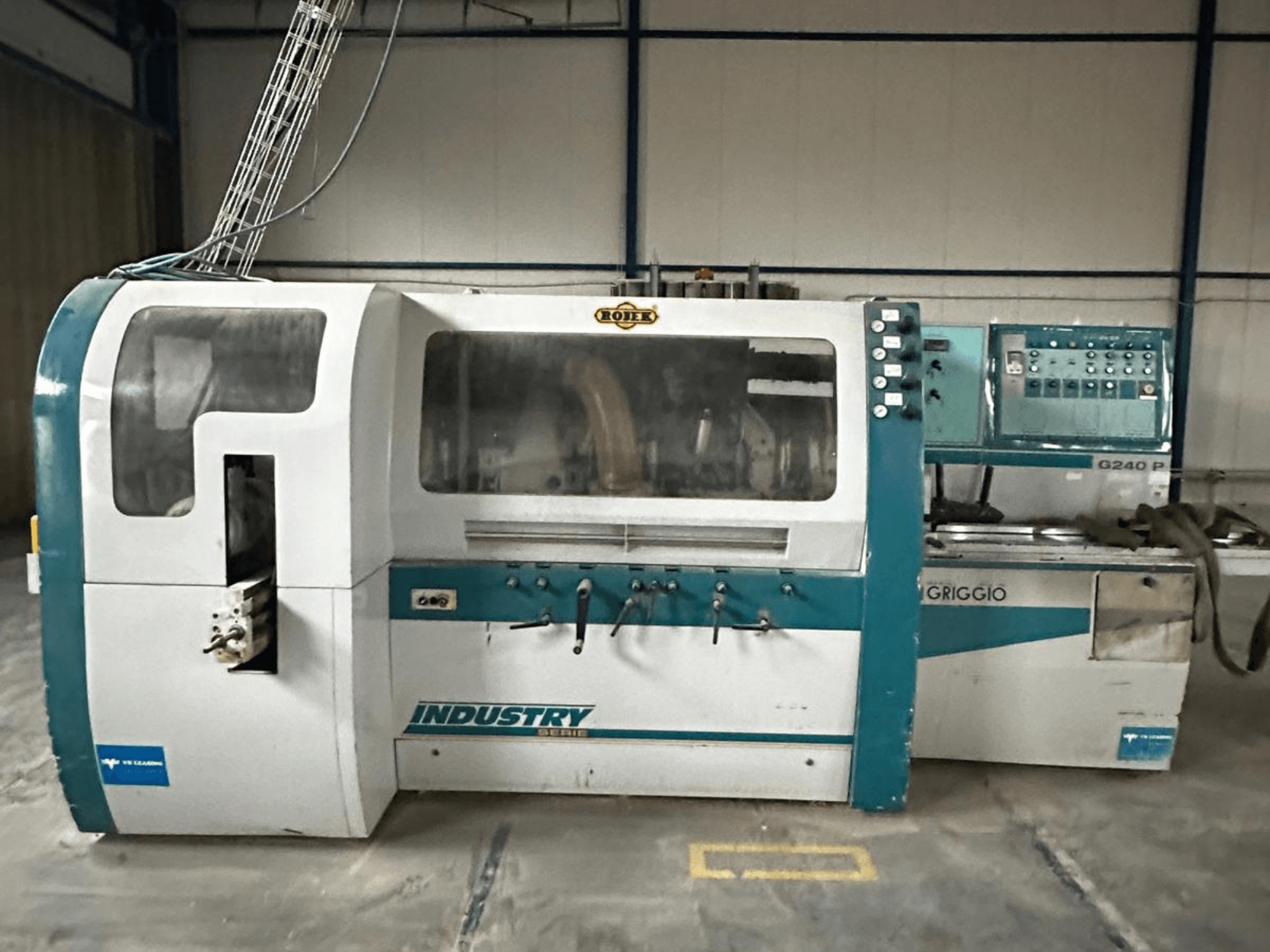 Griggio Industry G240 P machine, front view, with control panel and clear casing showcasing internal mechanisms.