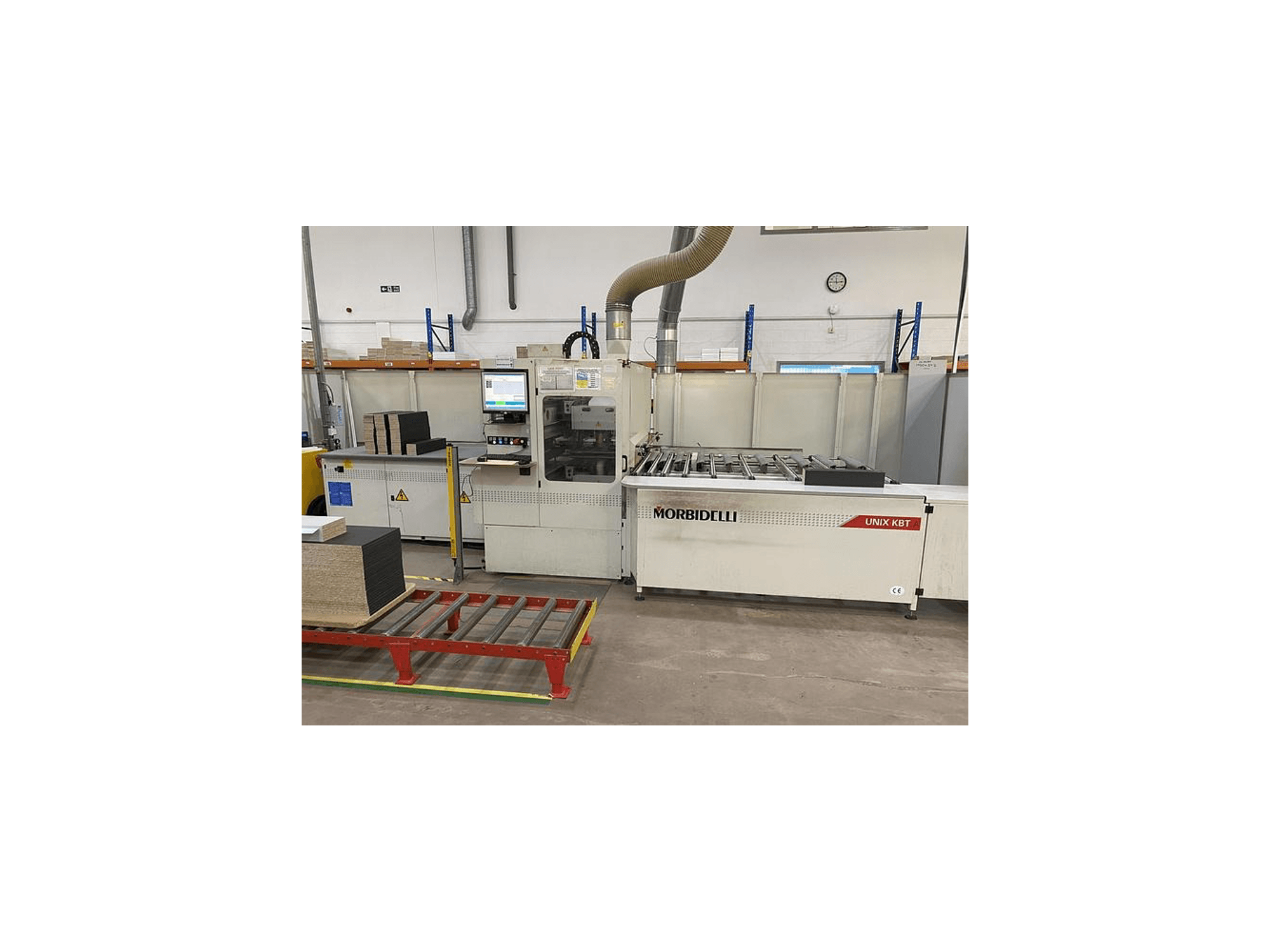 MORbidelli Unix KBT panel saw, front view, with control panel visible and stacked boards on adjacent cart.