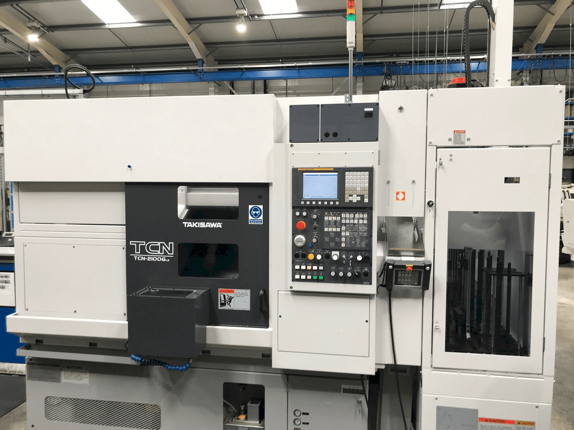 Front view of Takisawa TCN-2100G L6 machine