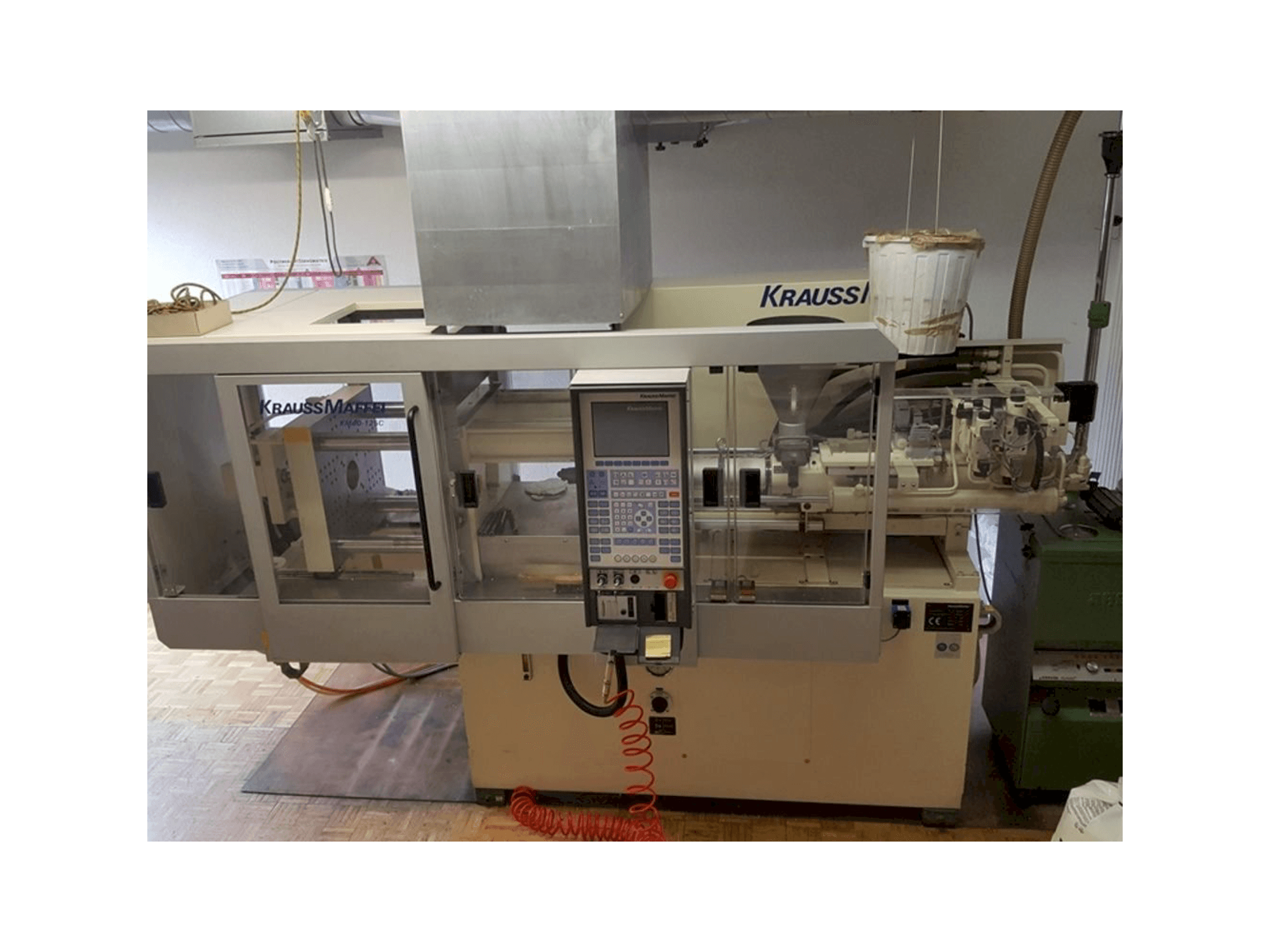 Front view of Krauss Maffei 40-125 C Winner machine